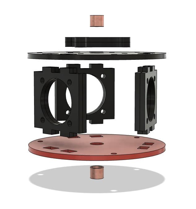 Figure 11: Housing stack exploded — bushings, top and base discs, three tabbed side frames.
