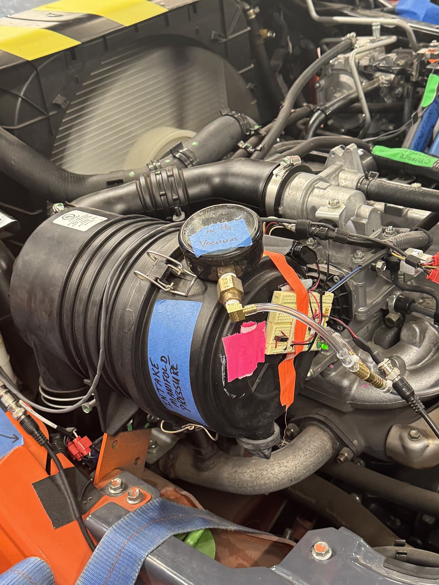 Figure 1: The instrumented 15Z on the stand, with sensor leads and thermocouples routed to the acquisition system.